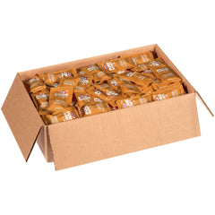 Kraft Honey packet spread on warm buttered toast