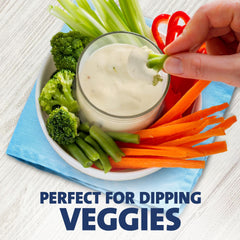 Kraft Ranch on a green salad shows easy drizzle and even coverage.