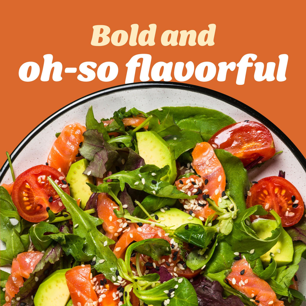 Kraft Reduced Fat Asian Toasted Sesame dressing on a colorful salad bowl