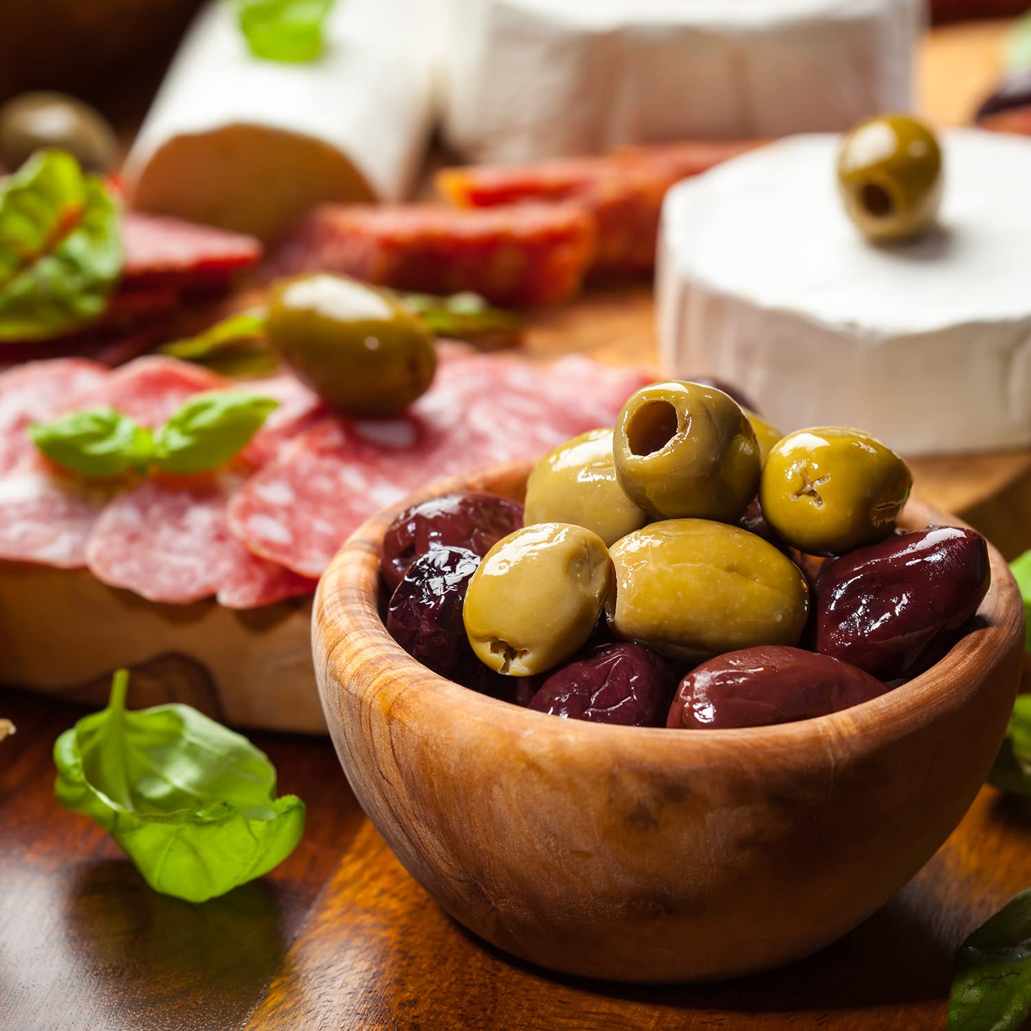 Krinos Kalamata olives on a meze platter, adding depth and color