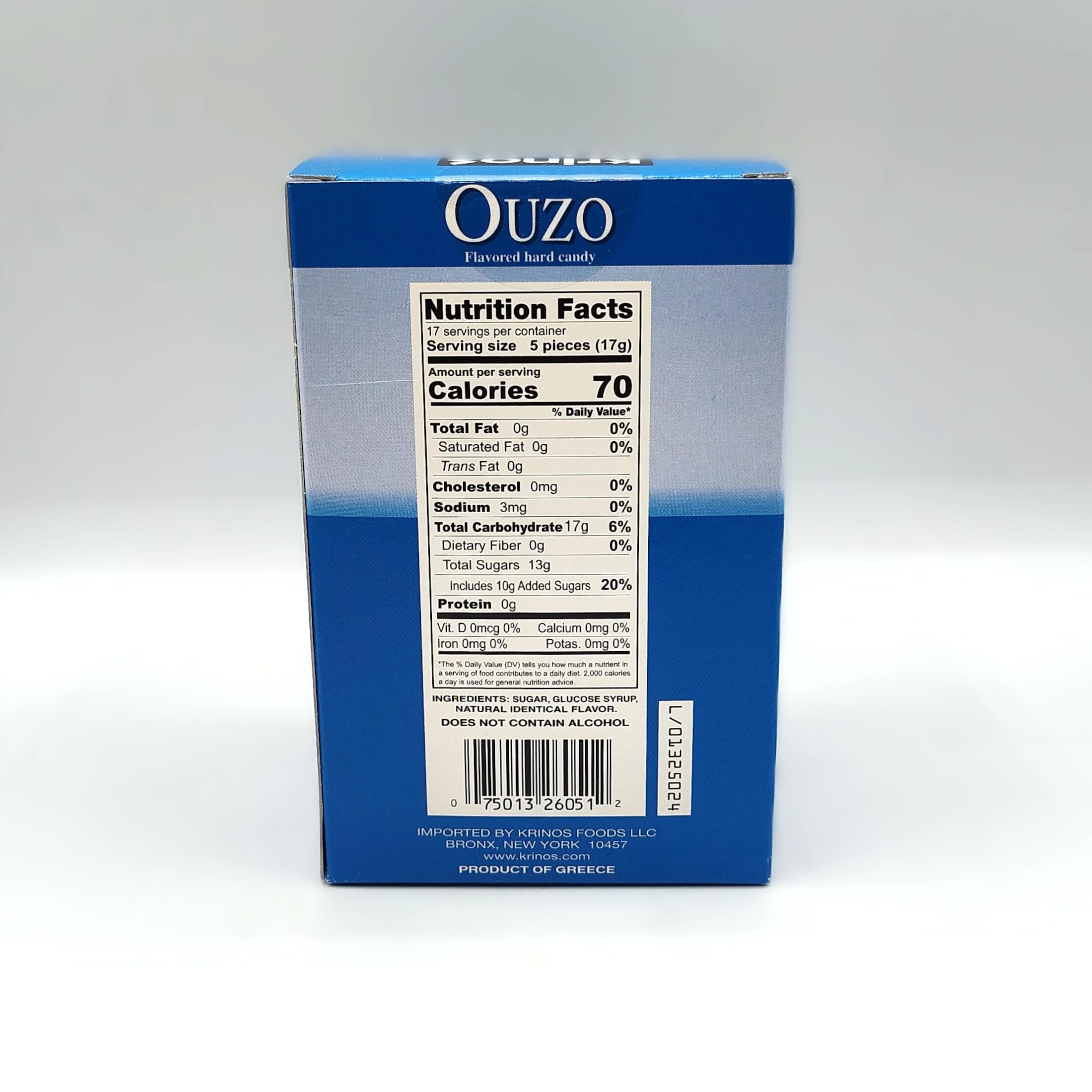 Krinos Ouzo Candy clear globe drops close-up, licorice flavor with tangy notes.