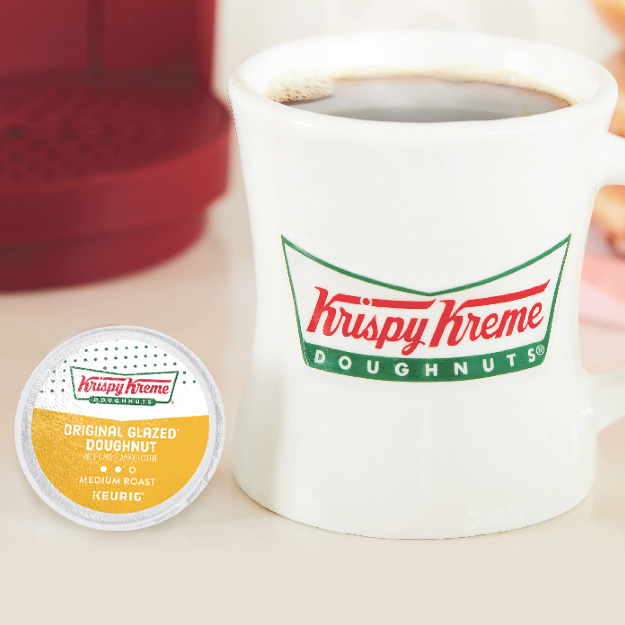 Krispy Kreme coffee pods in a kitchen setup for quick mornings.