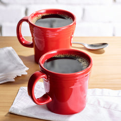 Closeup of Krispy Kreme ground coffee being poured for a rich brew
