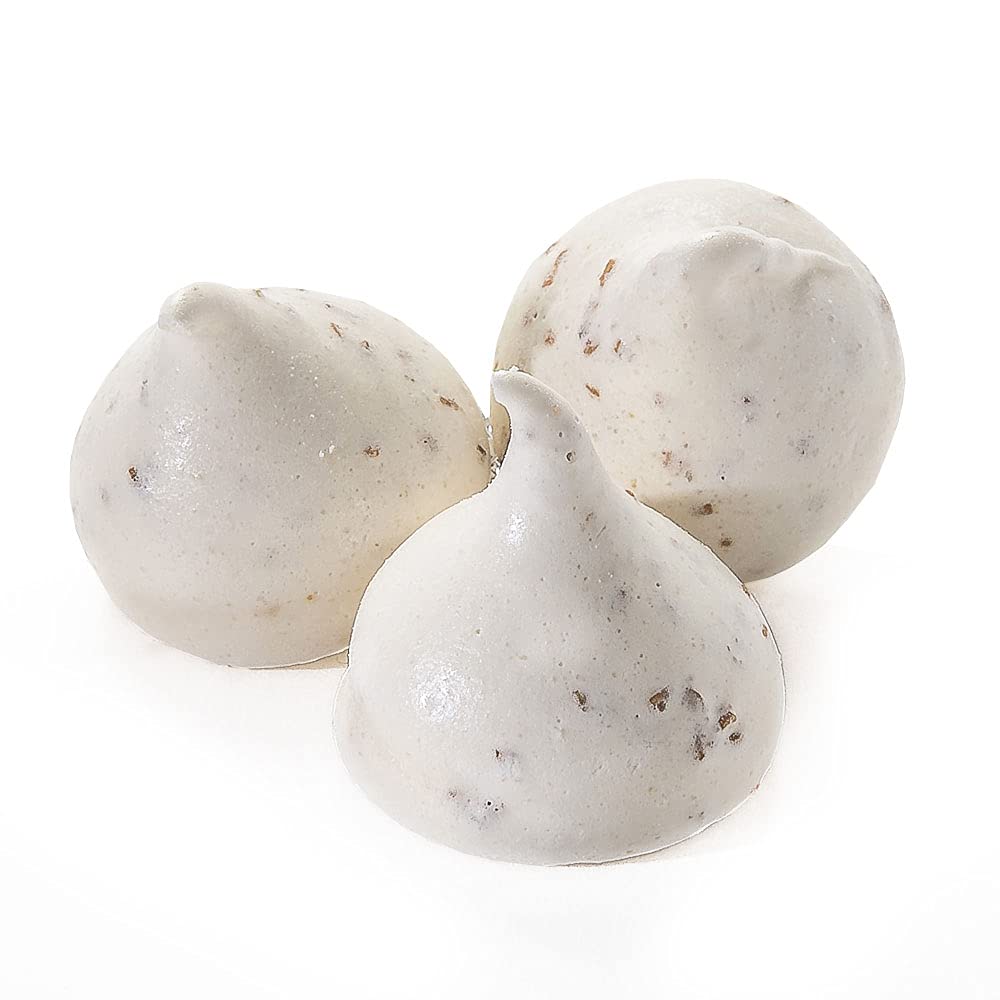 Close-up texture of Krunchy Melts meringue cookies, a fat-free option with a delicate crunch.