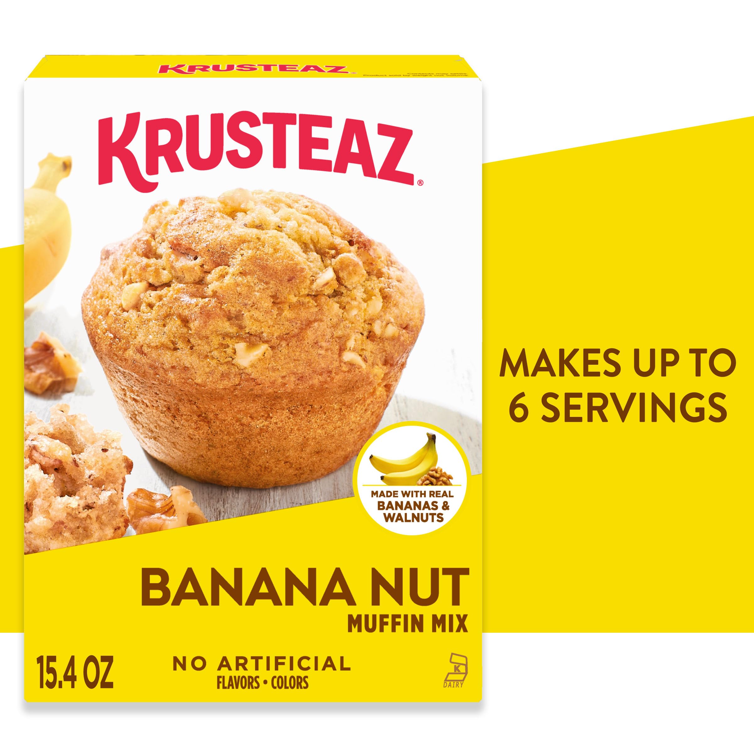 Krusteaz muffins in pan straight from oven with golden tops.