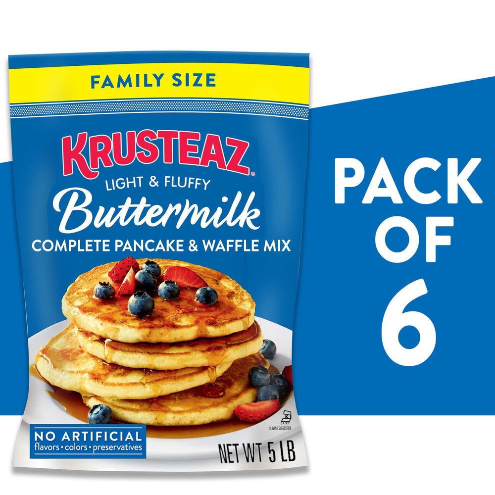 Krusteaz pancake stack topped with berries for a fresh breakfast.