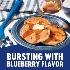 Krusteaz light fluffy pancakes on griddle—soft texture in minutes.