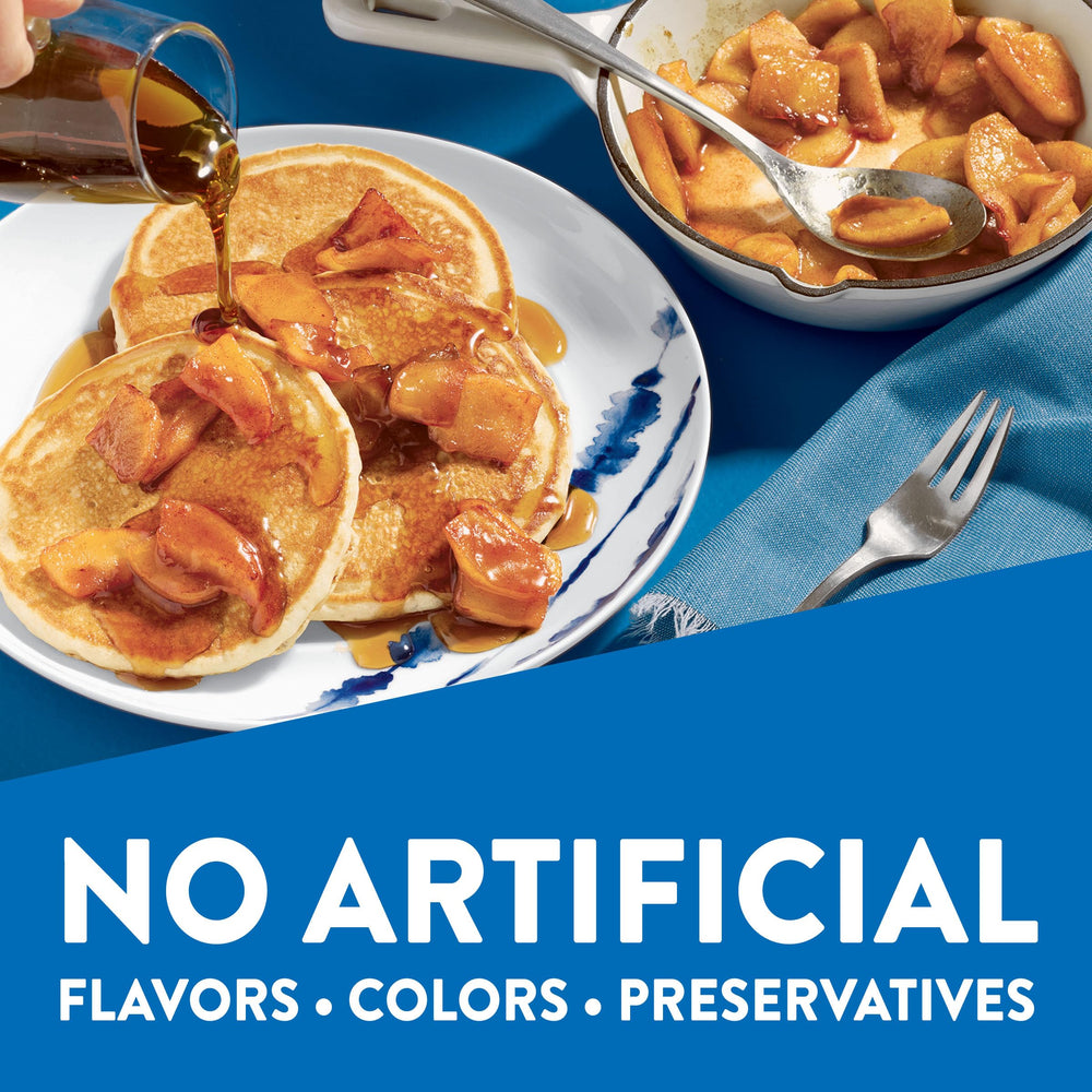 Butter and syrup accompany Krusteaz pancakes for a comforting morning.