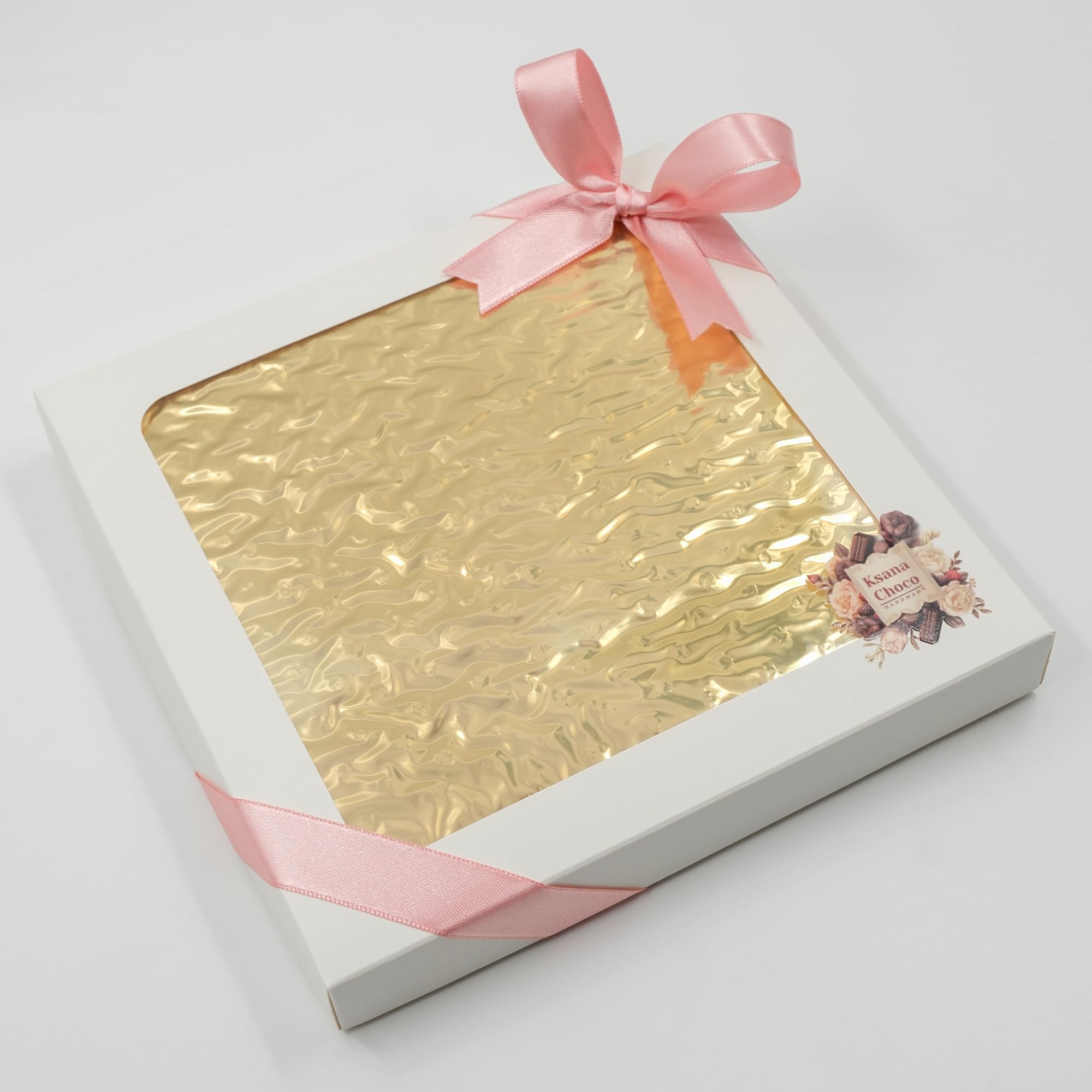 Ksana Choco 16-piece praline box showcasing premium handmade chocolates.