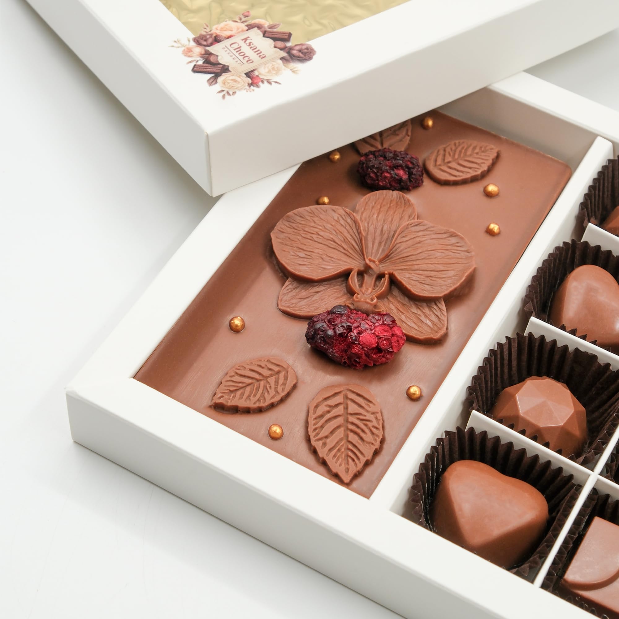 Ksana Choco Zesty Lemon & Orange praline with a bright citrus twist.