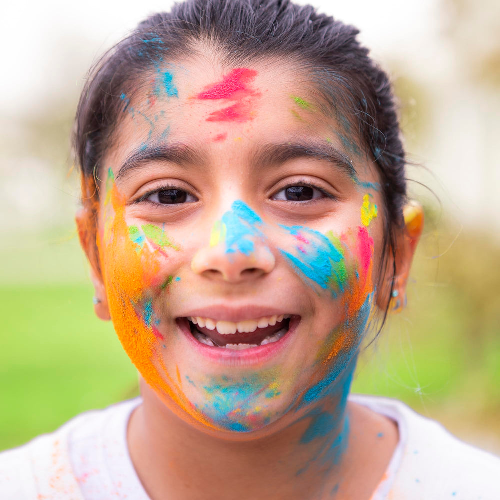 Kulture Khazana violet Holi color powder; lawn-safe color fun