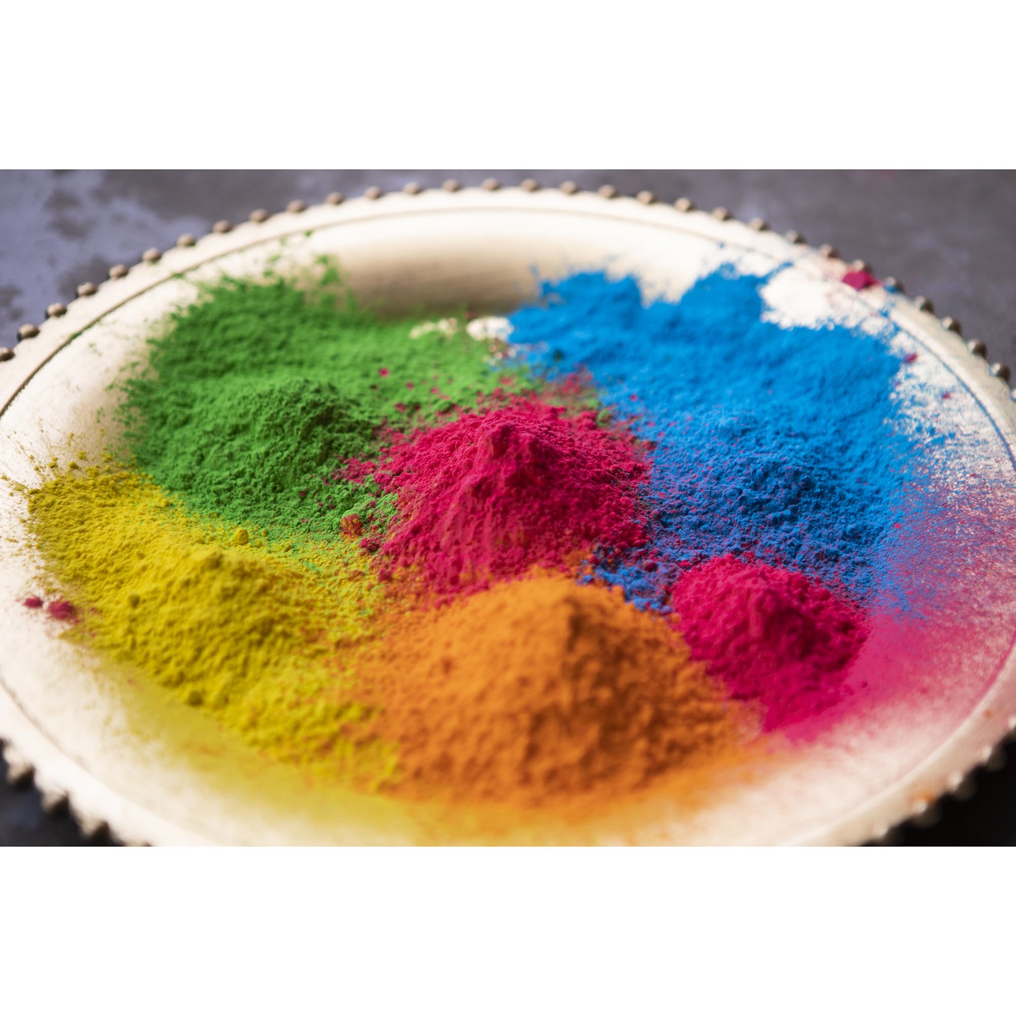 Kulture Khazana washable color powder on skin and fabrics for easy cleanup.