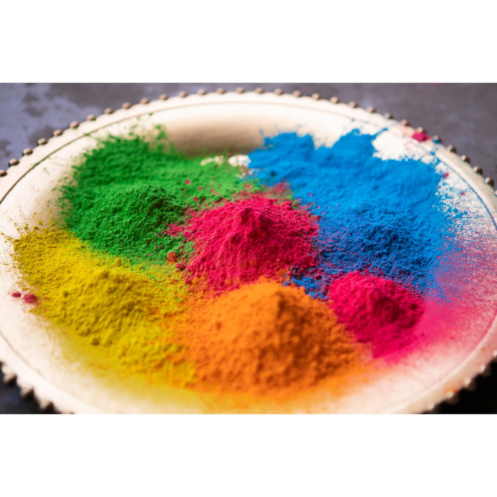 Kulture Khazana washable color powder on skin and fabrics for easy cleanup.