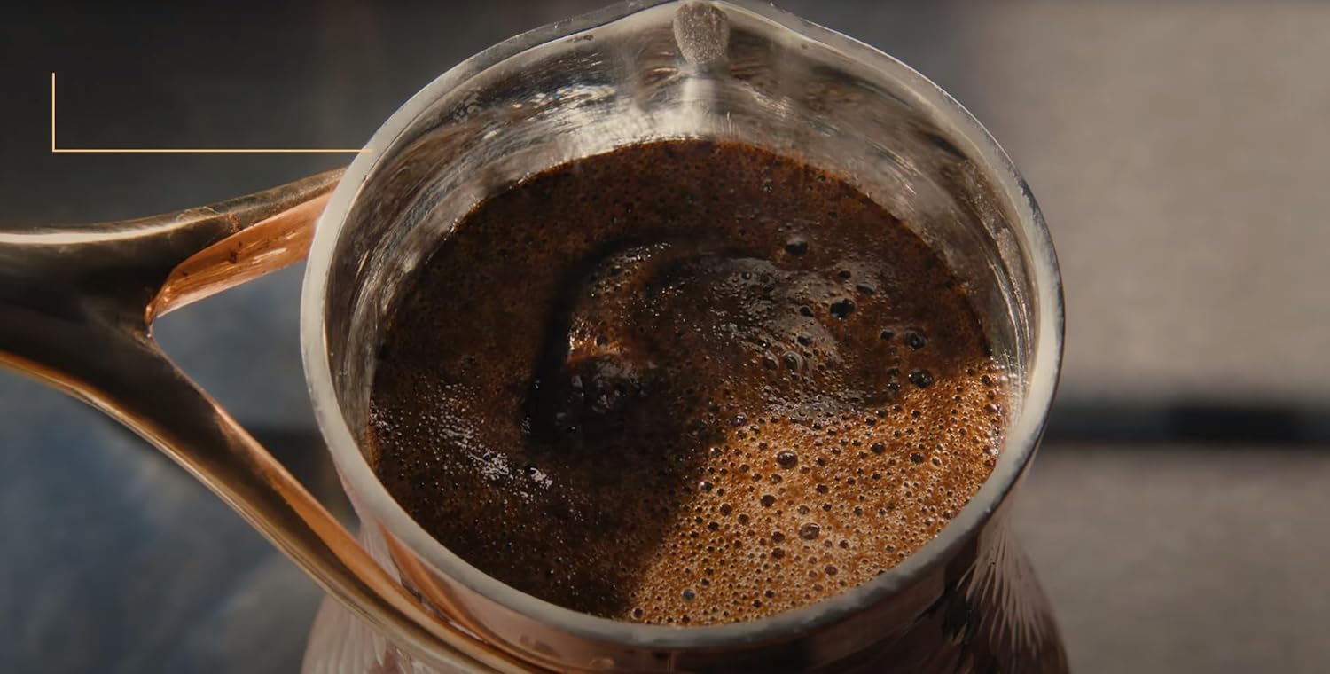 Kurukahveci Mehmet Efendi ground coffee ready for authentic Turkish preparation.
