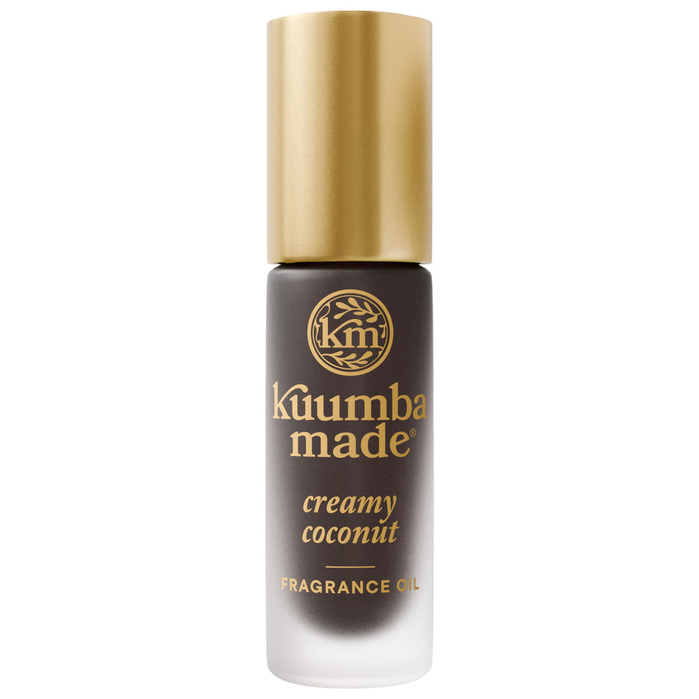 Kuumba Made Creamy Coconut fragrance oil bottle close-up for day-long tropical scent.