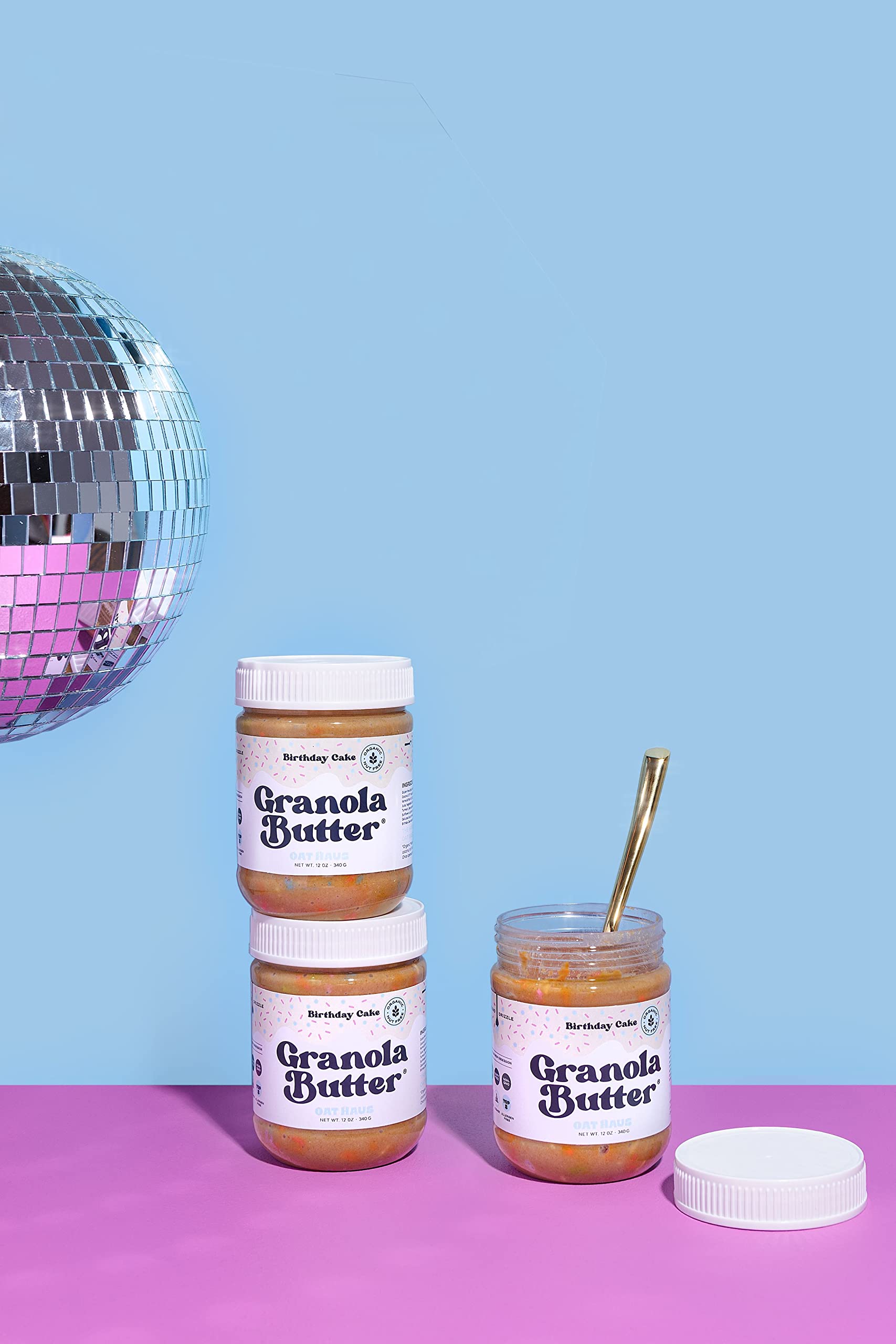 Funfetti swirl in KWEEN Oat Haus Birthday Cake Granola Butter jar.