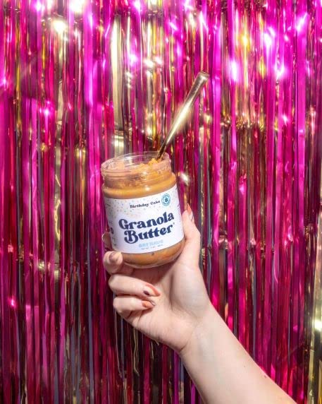 Close-up of KWEEN Oat Haus Birthday Cake Granola Butter jar texture.