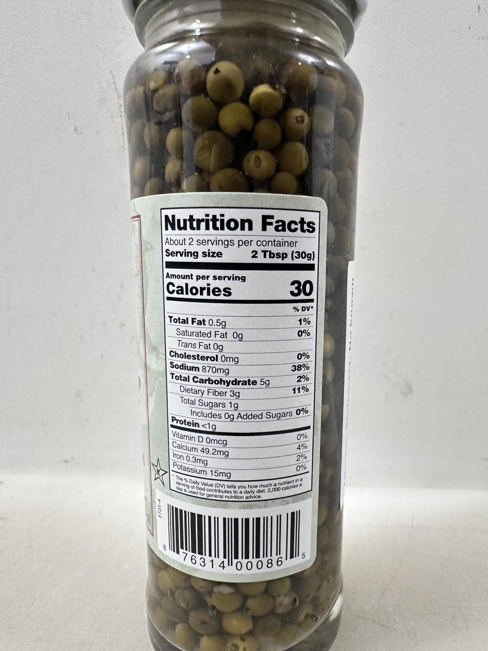 La Caperelle ingredients label detail highlights brine and peppercorn quality.