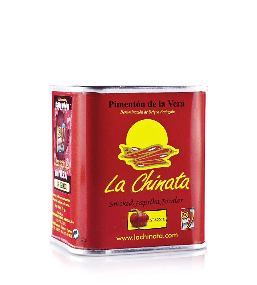 La Chinata Sweet Smoked Paprika Powder bottle pour enhances savory dishes.