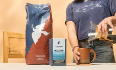Close-up of Corsica beans releasing rich aroma for a bold morning brew.