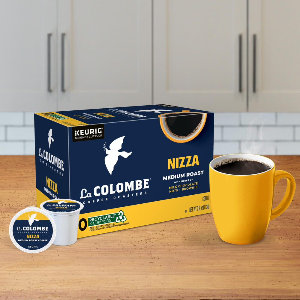 Cup on desk with La Colombe Nizza for a personal coffee moment.