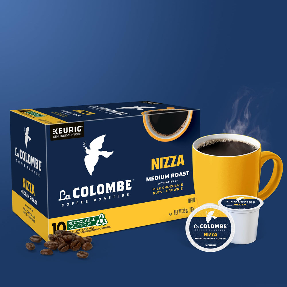 Morning routine with La Colombe Nizza on the desk suggests focus.