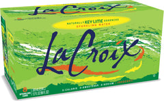 La Croix Key Lime pour into a glass, refreshing zero-calorie beverage.