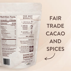 La Monarca Bakery hot chocolate cup steaming for a comforting, rich beverage.