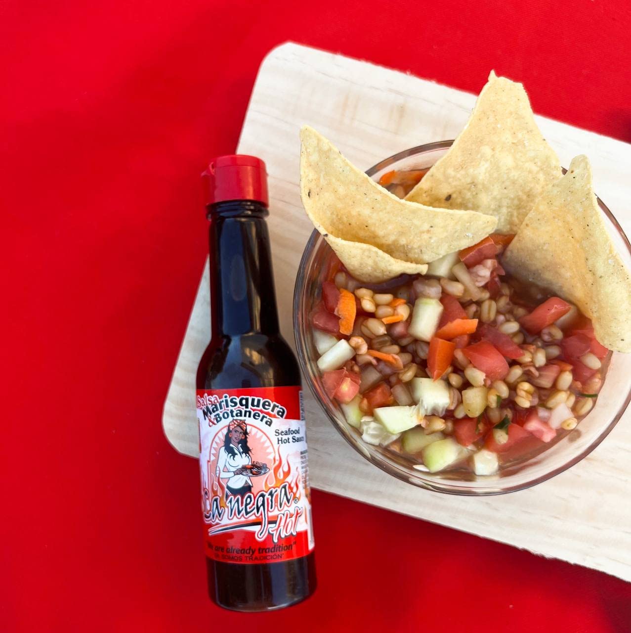La Negra Va hot salsa marisquera botanera pairs with snacks for bold bites.