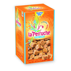 La Perruche pure cane brown sugar cubes in a box, enhancing coffee with caramel notes.