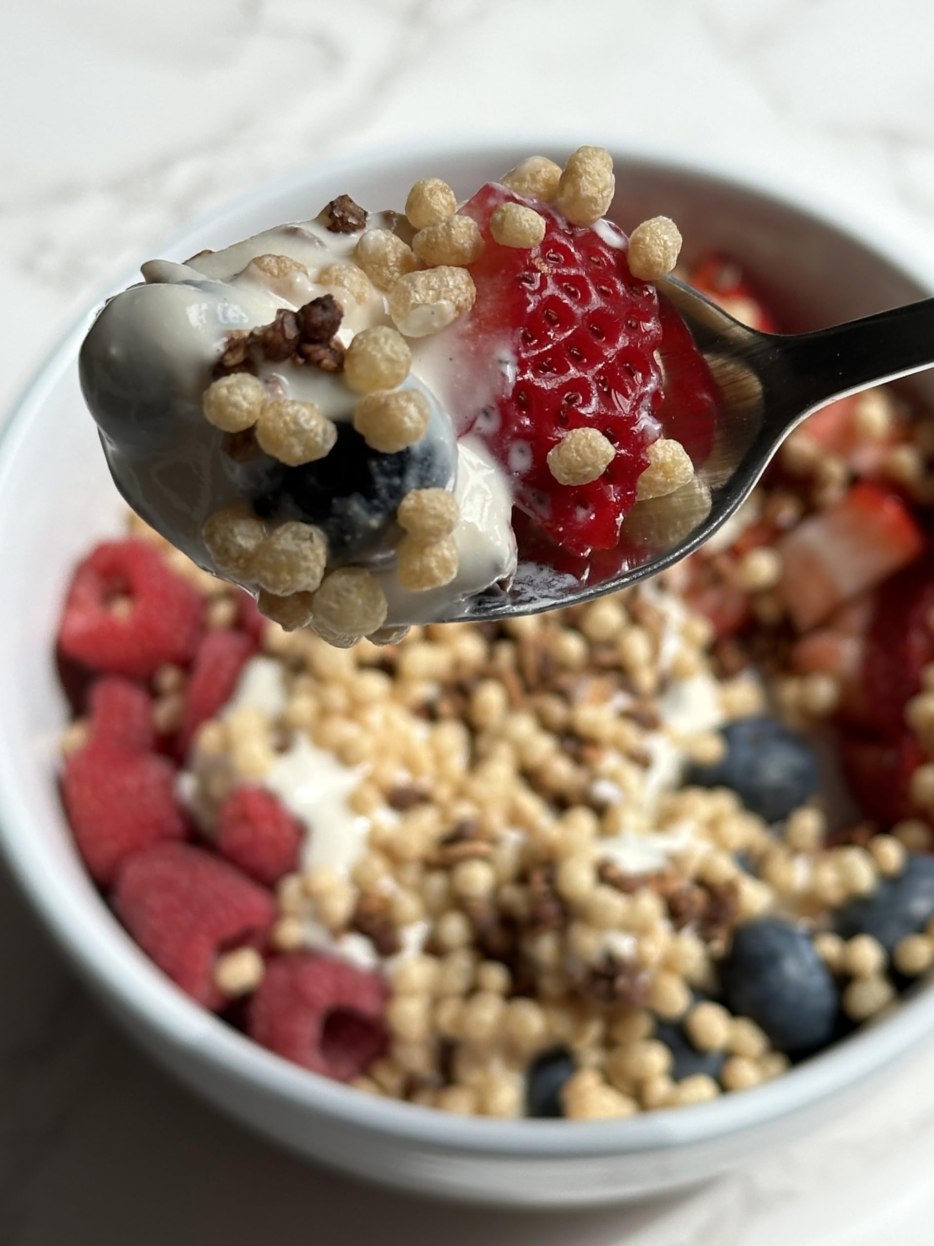 La Purita Quinoa Pops sprinkled on yogurt for extra texture.