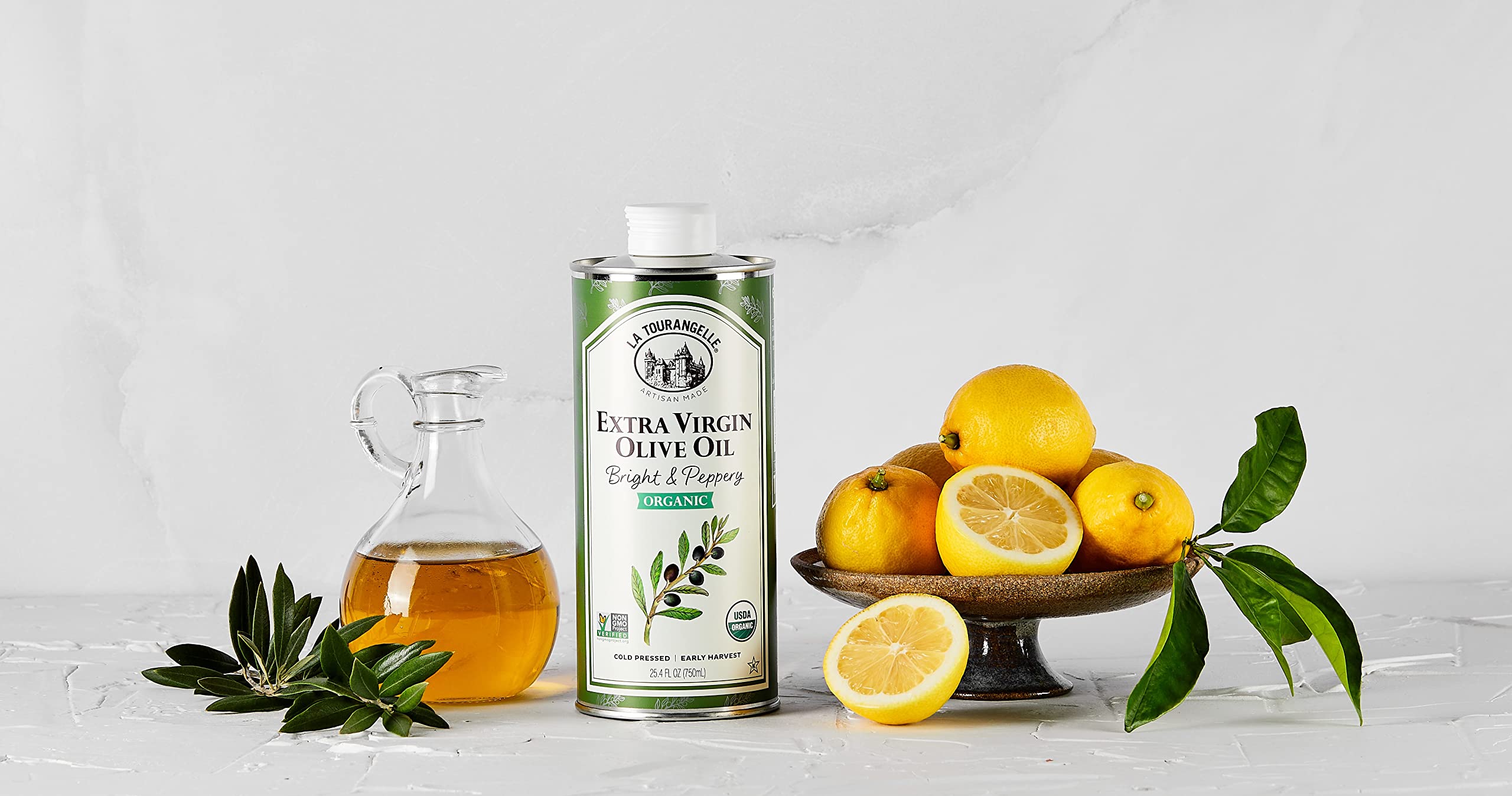 Kitchen scene featuring La Tourangelle Xvrgn Organic oil and spices.