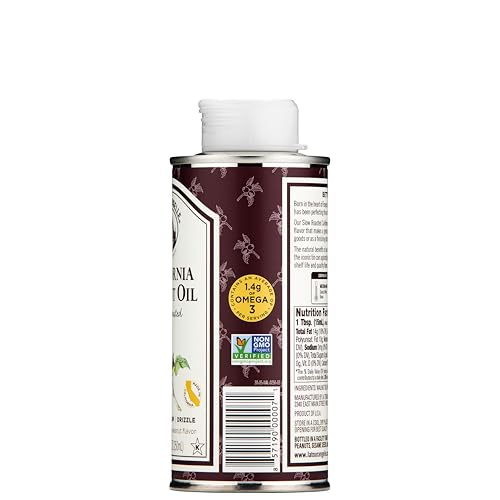 La Tourangelle roasted walnut oil pouring enhances sautés with walnut aroma.