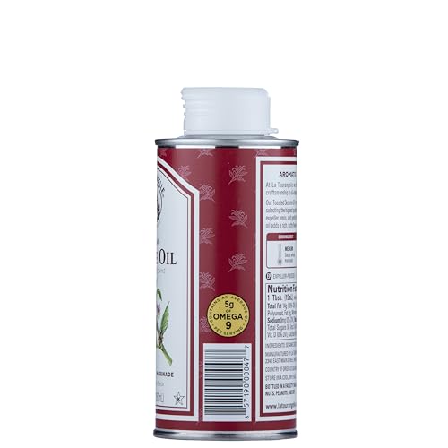 La Tourangelle Toasted Sesame Oil in a stir-fry pan, boosts savory notes and wok aroma.