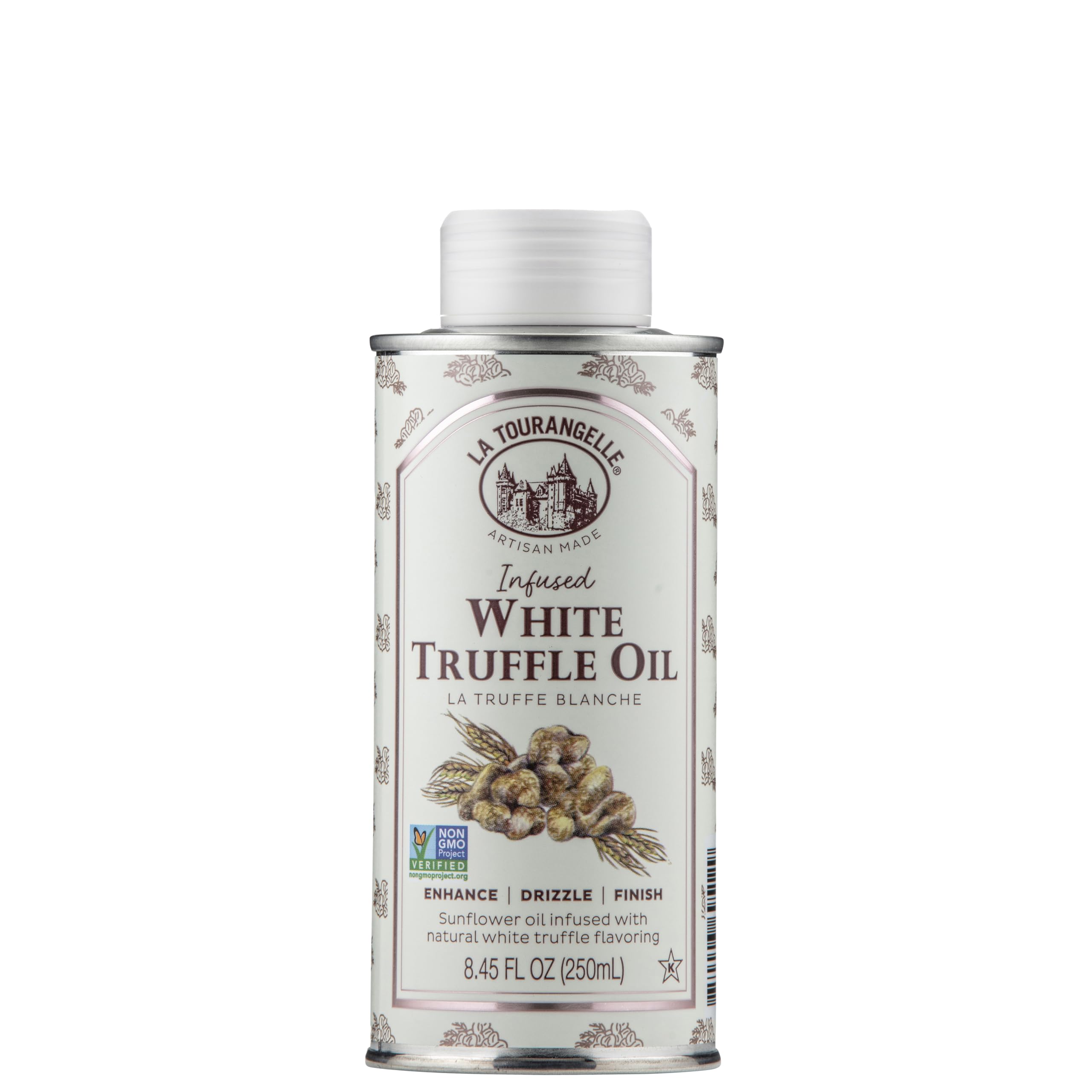 La Tourangelle White Truffle Oil bottle being poured over pasta for finishing touch.