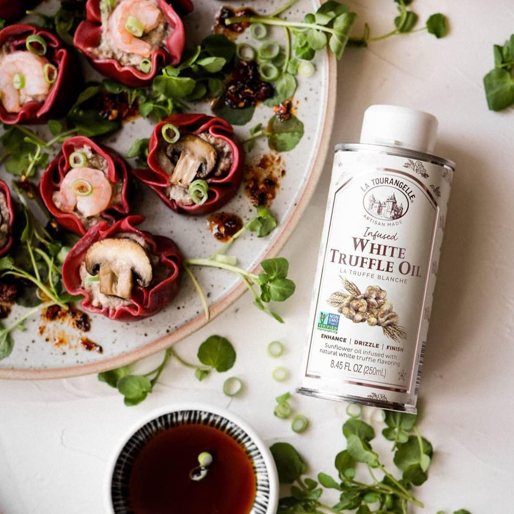 La Tourangelle White Truffle Oil brightening a fresh salad.