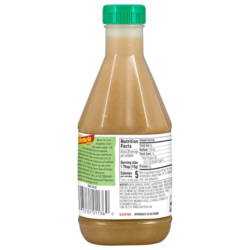 La Victoria Green Taco Sauce Mild bottle with peppers in background, family-friendly heat.