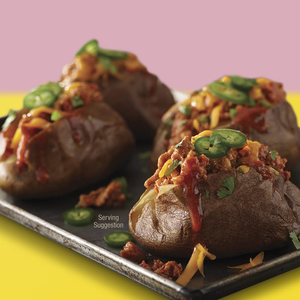 La Victoria Red Enchilada Sauce drizzled over tacos boosts flavor.