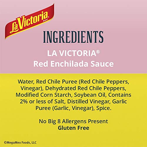 La Victoria red enchilada sauce traditional being poured smoothly.