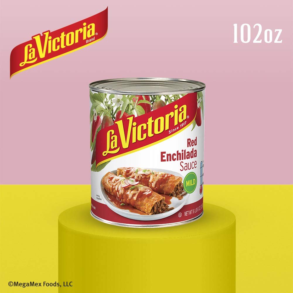 La Victoria red enchilada sauce traditional being used on tacos.