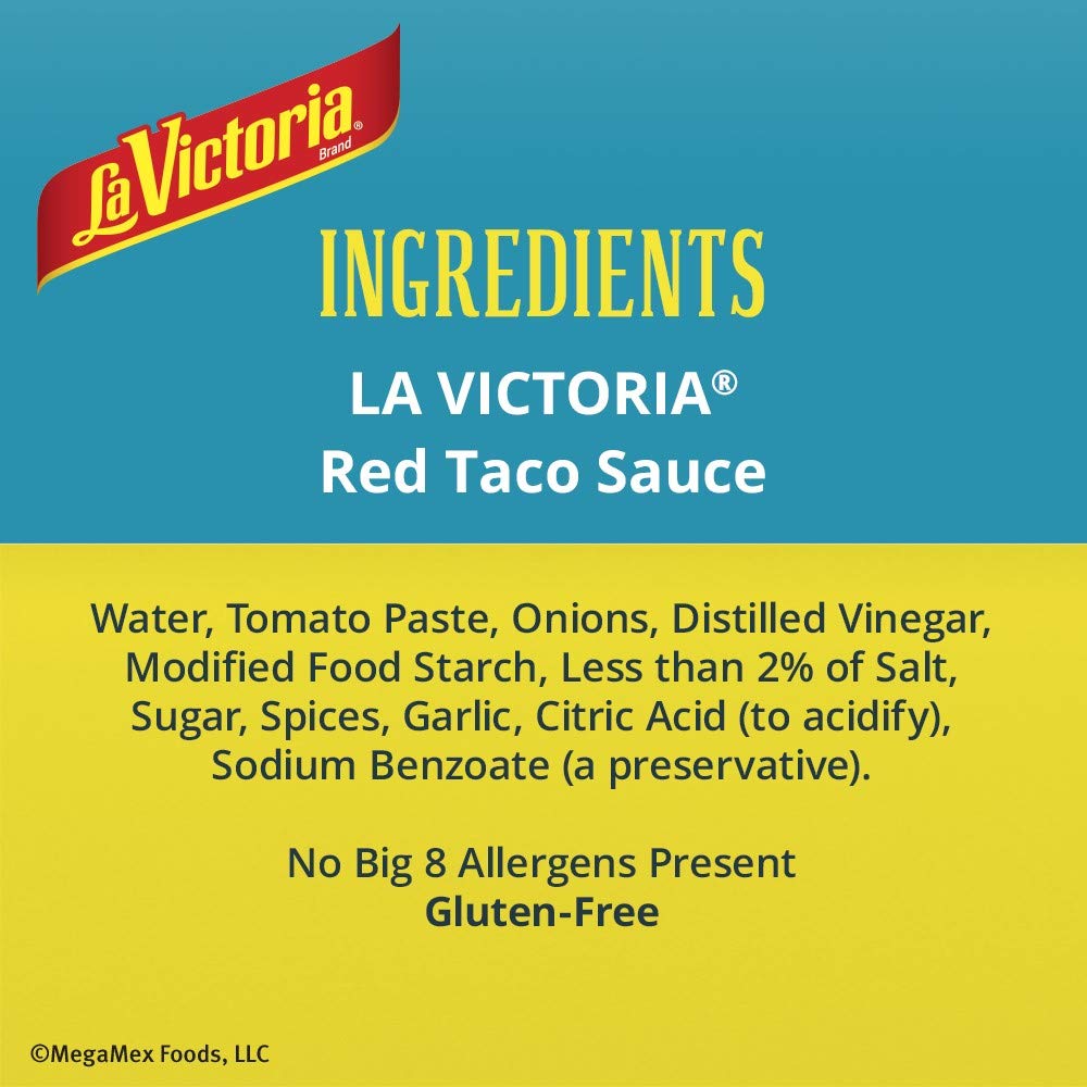 La Victoria Red Taco Sauce Mild being poured over tacos.