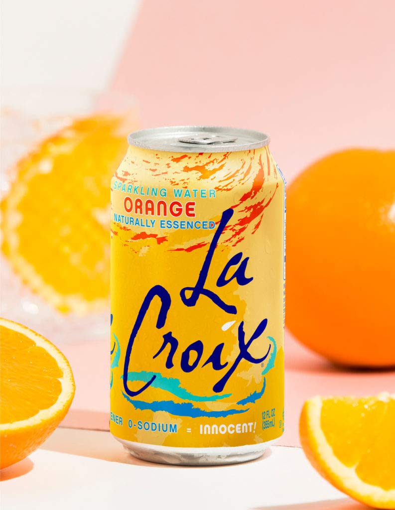 La Croix Orange in fridge scene suggesting chilled refreshment any time