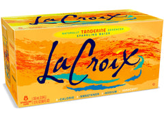 La Croix Tangerine bottle pouring into a glass, refreshing citrus aroma ready to sip