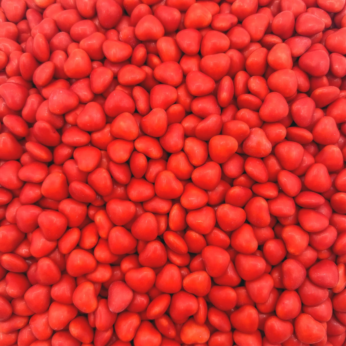 LAETAFOOD Cinnamon Hearts 1lb bag, glossy red hearts for party bowls and gifting.
