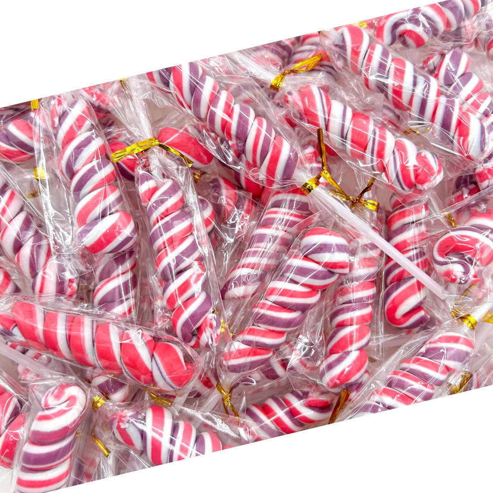 LAETAFOOD Gift bag candy option with bright pink lollipops for celebrations.