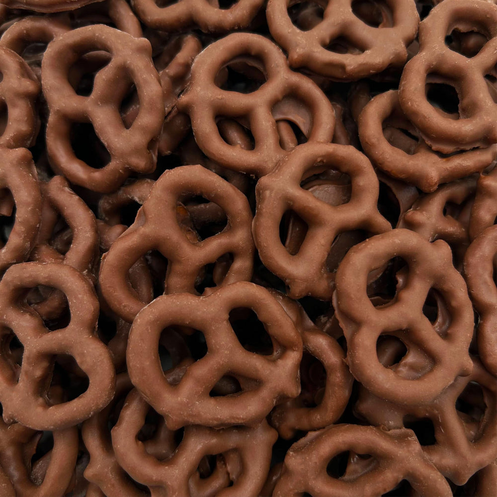 LAETAFOOD milk chocolate covered pretzels close up showing creamy coating and salt crunch