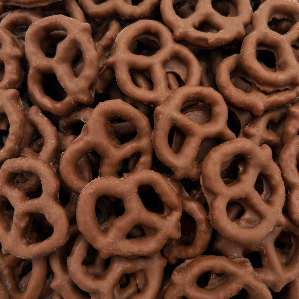 LAETAFOOD milk chocolate covered pretzels close up showing creamy coating and salt crunch