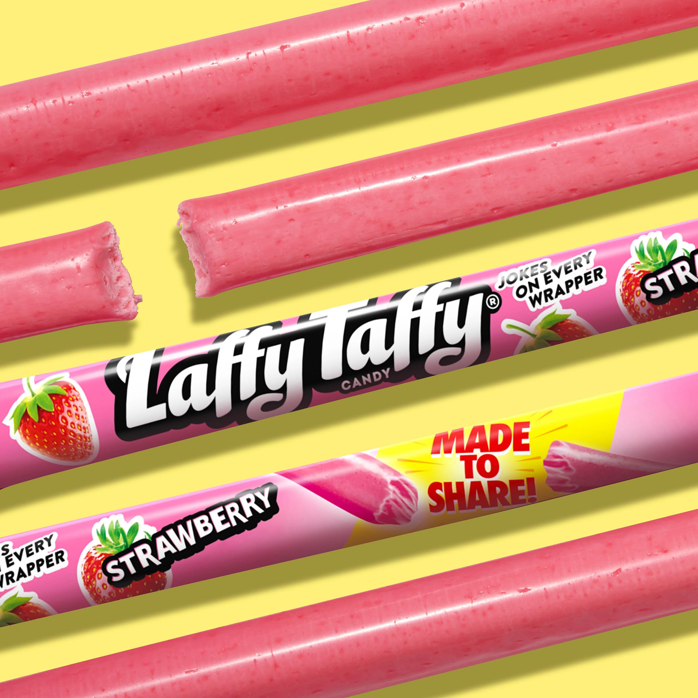 Laffy Taffy Rope Strawberry bite shot, chewy texture in focus.