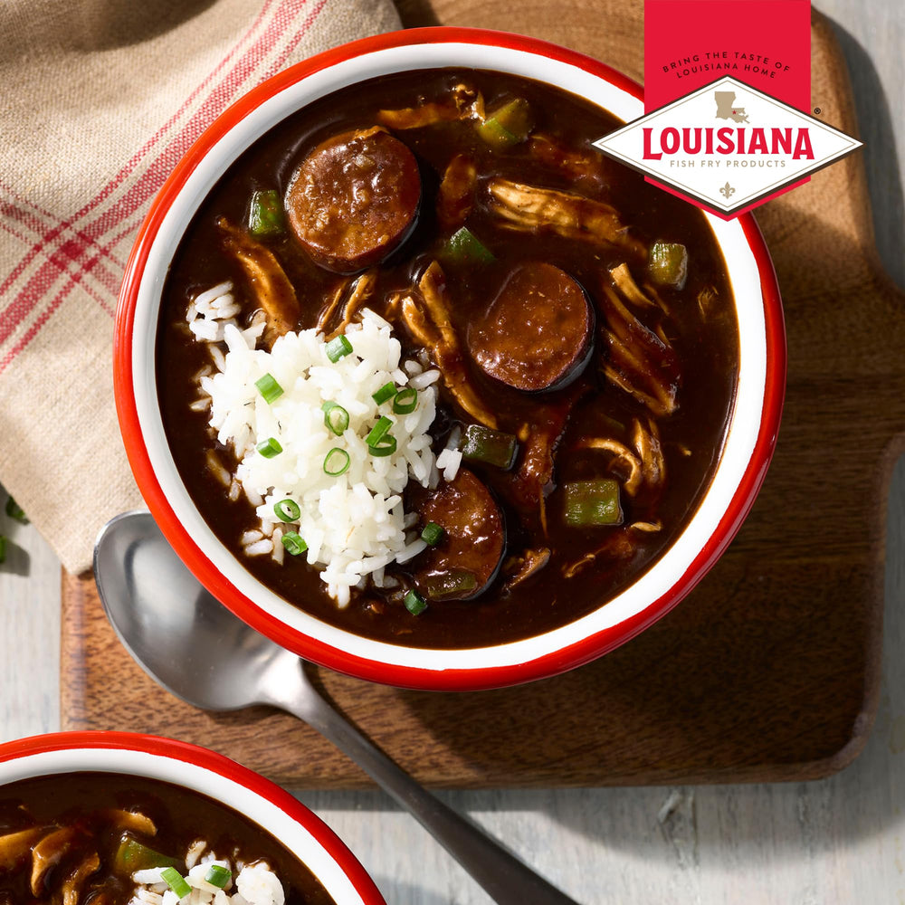 Louisiana Fish Fry Dark Roux Gumbo Base with meat and seafood option on skillet