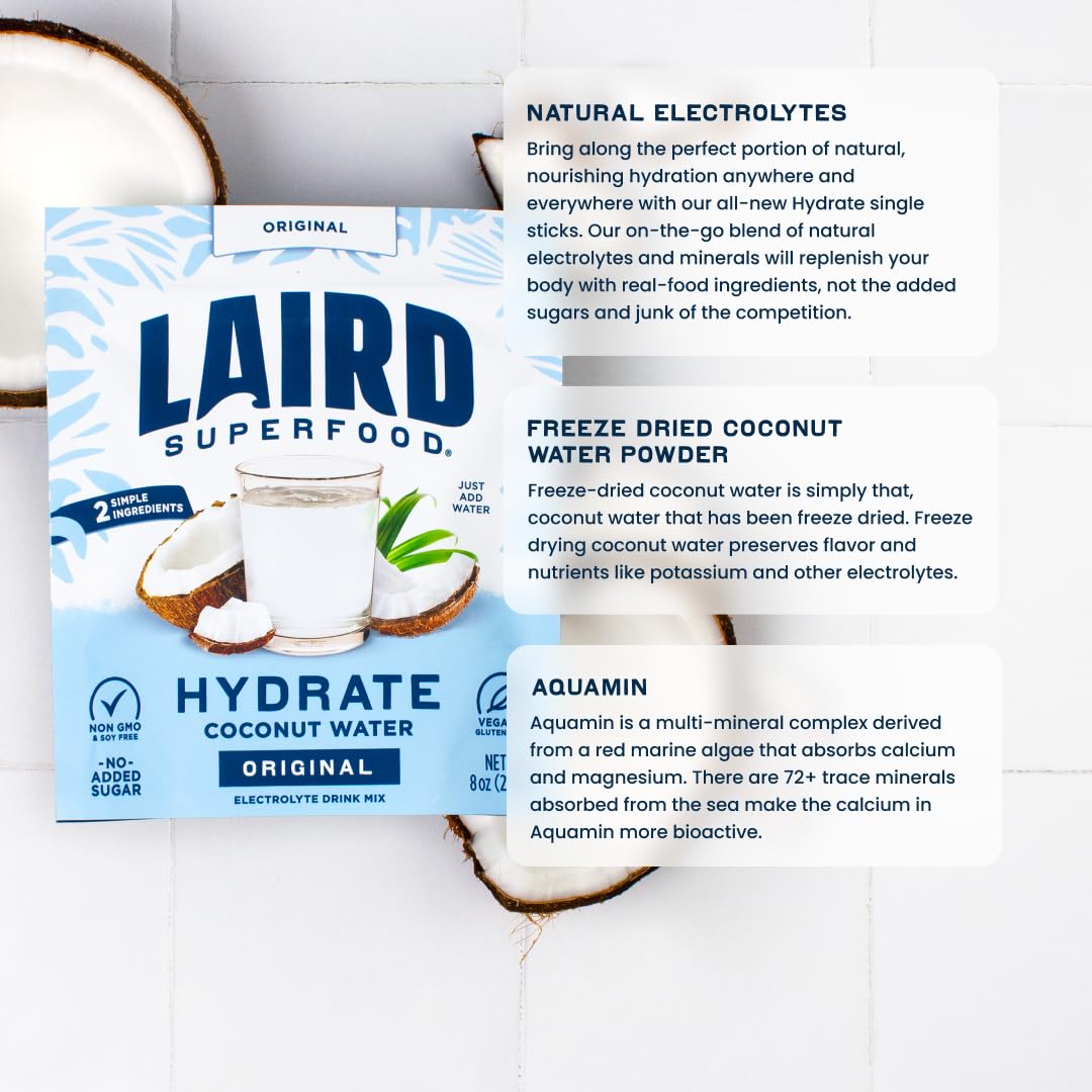 HYDRATE powder dissolving smoothly in water for a light coconut beverage.